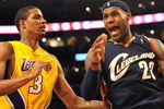 LOS ANGELES, CA - JANUARY 19:  (R) LeBron James #23 of the Cleveland Cavaliers reacts after a play next to Trevor Ariza #3 of the Los Angeles Lakers during the game at Staples Center on January 19, 2009 in Los Angeles, California.  The Lakers defeated the Cavaliers 105-88.  (Photo by Harry How/Getty Images)