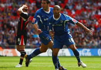 LONDON, ENGLAND - MAY 23:  Simeon Jackson of Gillingham (R) celebrates with Garry Richards as he scores their first goal during the Coca Cola League 2 Playoff Final match between Gillingham and Shrewsbury Town at Wembley Stadium on May 23, 2009 in London, England.  (Photo by Jamie McDonald/Getty Images)