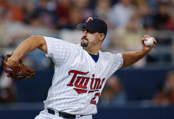MINNEAPOLIS - OCTOBER 5:  Pitcher Eric Milton #21 of the Minnesota Twins delivers the ball during game four of the American League Division Series against the Oakland A's at the Hubert H. Humphrey Dome on October 5, 2002 in Minneapolis, Minnesota.  The Twins win 11-2. (Photo by Brian Bahr/Getty Images)