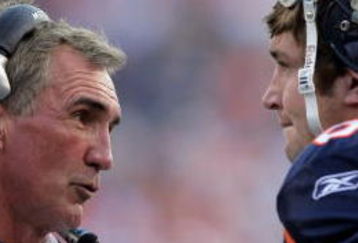 DENVER - NOVEMBER 02:  Head coach Mike Shanahan speaks with quarterback Jay Cutler of the Denver Broncos after he threw an interceptionf to cornerback Will Allen of the Miami Dolphins for a 32 yard first quarter touchdown during NFL action at Invesco Field at Mile High on November 2, 2008 in Denver, Colorado.  (Photo by Doug Pensinger/Getty Images)