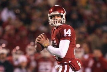 KANSAS CITY, MO - DECEMBER 06:  Quarterback Sam Bradford #14 of the Oklahoma Sooners looks to pass the ball during the game against the Missouri Tigers on December 6, 2008 at Arrowhead Stadium in Kansas City, Missouri. (Photo by Jamie Squire/Getty Images)