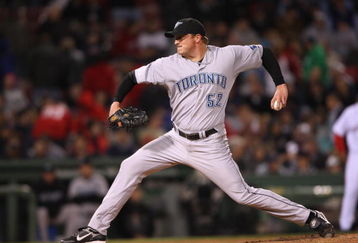 BOSTON - MAY 1:  B.J. Ryan #52 of the Toronto Blue Jays pitches against the Boston Red Sox on May 1, 2008 at Fenway Park in Boston, Massachusetts. (Photo by Elsa/Getty Images)