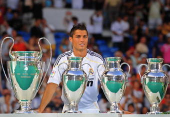 MADRID, SPAIN - JULY 06:  New Real Madrid player Cristiano Ronaldo is presented to a full house at the Santiago Bernabeu stadium on July 6, 2009 in Madrid, Spain.  (Photo by Denis Doyle/Getty Images)