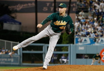 LOS ANGELES, CA - JUNE 16:  Michael Wuertz #48 of the Oakland Athletics pitches against the Los Angeles Dodgers at Dodger Stadium on June 16, 2009 in Los Angeles, California.  (Photo by Jeff Gross/Getty Images)