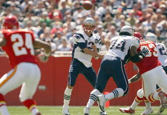FOXBORO, MA - SEPTEMBER 7:  Quarterback Tom Brady #12 of the New England Patriots passes the ball up the middle during their NFL game against the Kansas City Chiefs on September 7, 2008 at Gillette Stadium in Foxboro, Massachusetts. The Patriots defeated the Chiefs 17-10. (Photo by Elsa Garrison/Getty Images)