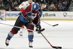 DENVER - JANUARY 24:  Joe Sakic #19 of the Colorado Avalanche takes a shot on goal against the Calgary Flames in the first period on January 24, 2006 at the Pepsi Center in Denver, Colorado. The Avalanche won 7-4.  (Photo by Brian Bahr/Getty Images)