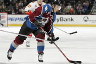 DENVER - JANUARY 24:  Joe Sakic #19 of the Colorado Avalanche takes a shot on goal against the Calgary Flames in the first period on January 24, 2006 at the Pepsi Center in Denver, Colorado. The Avalanche won 7-4.  (Photo by Brian Bahr/Getty Images)