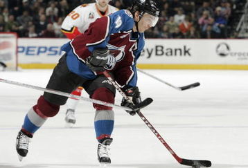 DENVER - JANUARY 24:  Joe Sakic #19 of the Colorado Avalanche takes a shot on goal against the Calgary Flames in the first period on January 24, 2006 at the Pepsi Center in Denver, Colorado. The Avalanche won 7-4.  (Photo by Brian Bahr/Getty Images)