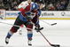 DENVER - JANUARY 24:  Joe Sakic #19 of the Colorado Avalanche takes a shot on goal against the Calgary Flames in the first period on January 24, 2006 at the Pepsi Center in Denver, Colorado. The Avalanche won 7-4.  (Photo by Brian Bahr/Getty Images)