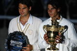 LONDON - JULY 06:  Rafael Nadal of Spain and Roger Federer of Switzerland pose for pictures with after Nadal won in five sets in the final on day thirteen of the Wimbledon Lawn Tennis Championships at the All England Lawn Tennis and Croquet Club on July 6, 2008 in London, England.  (Photo by Julian Finney/Getty Images)