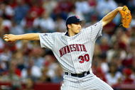 ANAHEIM, CA - MAY 30:  Starting pitcher Scott Baker #30 of the Minnesota Twins pitches against the Los Angeles Angels of Anaheim May 30, 2006 at Angel Stadium in Anaheim, California.  (Photo by Christian Petersen/Getty Images)