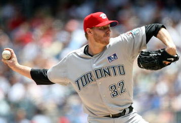 NEW YORK - JULY 04:  Roy Halladay #32 of the Toronto Blue Jays pitches against the New York Yankees on July 4, 2009 at Yankee Stadium in the Bronx borough of New York City.  (Photo by Nick Laham/Getty Images)