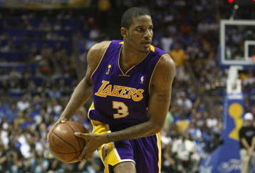 ORLANDO, FL - JUNE 14:  Trevor Ariza #2 of the Los Angeles Lakers looks to move the ball against the Orlando Magic in Game Five of the 2009 NBA Finals on June 14, 2009 at Amway Arena in Orlando, Florida. The Lakers won 99-86. NOTE TO USER:  User expressly acknowledges and agrees that, by downloading and or using this photograph, User is consenting to the terms and conditions of the Getty Images License Agreement. (Photo by Elsa/Getty Images) 