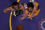 LOS ANGELES, CA - MAY 21:  Manu Ginobili #20 of the San Antonio Spurs and Pau Gasol #16 of the Los Angeles Lakers go after a rebound in Game One of the Western Conference Finals during the 2008 NBA Playoffs on May 21, 2008 at Staples Center in Los Angeles, California.  The Lakers defeated the Spurs 89-85. NOTE TO USER: User expressly acknowledges and agrees that, by downloading and/or using this Photograph, user is consenting to the terms and conditions of the Getty Images License Agreement.  (Photo by Jeff Gross/Getty Images)