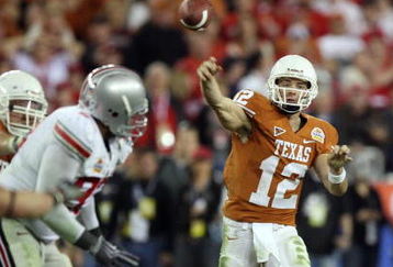 GLENDALE, AZ - JANUARY 05:  Quarterback Colt McCoy #12 of the Texas Longhorns throws a pass against the Ohio State Buckeyes during the Tostitos Fiesta Bowl Game on January 5, 2009 at University of Phoenix Stadium in Glendale, Arizona.   The Longhorns defeated the Buckeyes 24-21.  (Photo by Jed Jacobsohn/Getty Images)