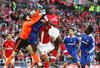 LONDON - APRIL 18:  Petr Cech of Chelsea punches clear from Kolo Toure of Arsenal during the FA Cup sponsored by E.ON Semi Final match between Arsenal and Chelsea at Wembley Stadium on April 18, 2009 in London, England.  (Photo by Phil Cole/Getty Images)