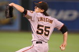 OAKLAND, CA - JUNE 23:  Tim Lincecum #55 of the San Francisco Giants pitches against the Oakland Athletics during a Major League Baseball game on June 23, 2009 at the Oakland Coliseum in Oakland, California.  (Photo by Jed Jacobsohn/Getty Images)