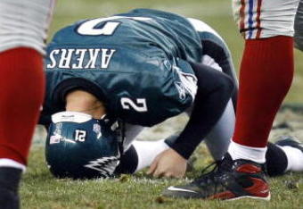 PHILADELPHIA - DECEMBER 9:  David Akers #2 of the Philadelphia Eagles reacts after his 57-yard field goal attempt hits the goalpost against New York Giants at the Lincoln Financial Field December 9, 2007 in Philadelphia, Pennsylvania.  (Photo by Jeff Zelevansky/Getty Images)
