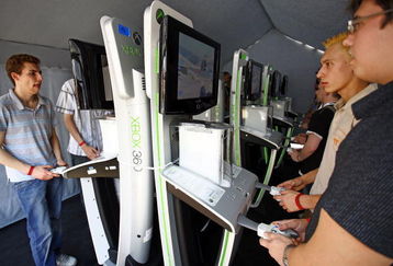 LEIPZIG, GERMANY - AUGUST 24:  Fair goers  test the Halo 3 at the computer games fair Games Convention 24 August, 2007 in Leipzig, Germany. Organisers of Europe's largest show for interactive entertainment expect 200,000 visitors during the event taking place to 26 August.  (Photo by Carsten Koall/Getty Images)