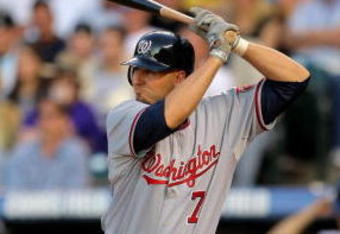 DENVER - JULY 06:  Catcher Josh Bard #7 of the Washington Nationals takes an at bat against the Colorado Rockies during MLB action at Coors Field on July 6, 2009 in Denver, Colorado. The Rockies defeated the Nationals 1-0.  (Photo by Doug Pensinger/Getty Images)