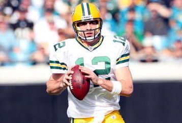 JACKSONVILLE, FL - DECEMBER 14:  Aaron Rodgers #12 of the Green Bay Packers attempts a pass during the game against the Jacksonville Jaguars at Jacksonville Municipal stadium on December 14, 2008 in Jacksonville, Florida.  (Photo by Sam Greenwood/Getty Images)