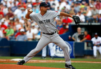 ATLANTA - JUNE 27:  Starting pitcher Tim Wakefield #49 of the Boston Red Sox pitches against the Atlanta Braves at Turner Field on June 27, 2009 in Atlanta, Georgia.  (Photo by Kevin C. Cox/Getty Images)