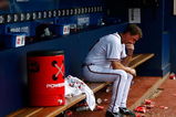 ATLANTA - JUNE 27:  Chipper Jones #10 of the Atlanta Braves sits dejected in the dugout after falling to the Boston Red Sox 1-0 at Turner Field on June 27, 2009 in Atlanta, Georgia.  (Photo by Kevin C. Cox/Getty Images)