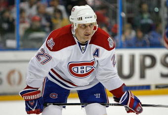 ATLANTA - MARCH 6:  Assistant captain and forward Alex Kovalev #27 of the Montreal Canadiens takes a breather before a faceoff during the game against the Atlanta Thrashers at Philips Arena on March 6, 2009 in Atlanta, Georgia.  The Thrashers beat the Canadiens 2-0.  (Photo by Mike Zarrilli/Getty Images)