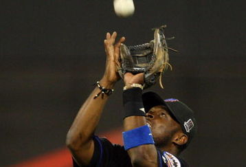 NEW YORK - JUNE 26:  Luis Castillo #1 of the New York Mets catches a pop up to end the seventh inning against the New York Yankees on June 26, 2009 at Citi Field in the Flushing neighborhood of the Queens borough of New York City. The Yankees defeated the Mets 9-1.  (Photo by Jim McIsaac/Getty Images)