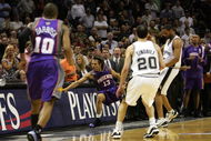 SAN ANTONIO - MAY 14: Guard Steve Nash #13 of the Phoenix Suns falls out of bounds after a flagrant foul by Robert Horry #5 of the San Antonio Spurs in Game Four of the Western Conference Semifinals during the 2007 NBA Playoffs on May 14, 2007 at AT&T Center in San Antonio, Texas. The Suns defeated the Spurs 104-98 to tie the series 2-2. NOTE TO USER: User expressly acknowledges and agrees that, by downloading and or using this photograph, User is consenting to the terms and conditions of the Getty Images License Agreement. (Photo by Ronald Martinez/Getty Images)