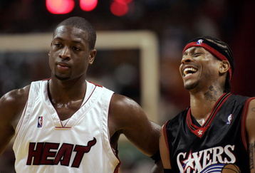 MIAMI - NOVEMBER 18: Guard Dwyane Wade #3 of the Miami Heat stands by Guard Allen Iverson #3 of the Philadelphia 76ers while laughing on November 18, 2005 at the American Airlines Arena in Miami  Florida. NOTE TO USER: User expressly acknowledges and agrees that, by downloading and or using this photograph, User is consenting to the terms and conditions of the Getty Images License Agreement. (Photo by Eliot J. Schechter/Getty Images) 