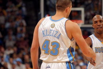 DENVER - APRIL 19:  Chauncey Billups #7 and Linas Kleiza #43 of the Denver Nuggets react after a play against the New Orleans Hornets in Game One of the Western Conference Quarterfinals during the 2009 NBA Playoffs at Pepsi Center on April 19, 2009 in Denver, Colorado. Billups had a game high 36 points as the Nuggets defeated the Hornets 113-84.  NOTE TO USER: User expressly acknowledges and agrees that, by downloading and or using this photograph, User is consenting to the terms and conditions of the Getty Images License Agreement.  (Photo by Doug Pensinger/Getty Images)