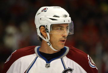 CHICAGO - NOVEMBER 03:  Joe Sakic #19 of the Colorado Avalanche looks on against the Chicago Blackhawks at the United Center on November 3, 2008 in Chicago, Illinois.  (Photo by Jeff Gross/Getty Images)