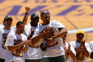 LOS ANGELES, CA - JUNE 17: Derek Fisher of the Los Angeles Lakers celebrates on stage during the 2009 NBA Championship Victory Parade at the Los Angeles Memorial Coliseum on June 17, 2009 in Los Angeles, California. (Photo by Jeff Gross/Getty Images)