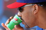 CINCINNATI, OH - SEPTEMBER 29: Derrek Lee #25 of the Chicago Cubs drinks water during the MLB game against the Cincinnati Reds on September 29, 2007 at Great American Ballpark in Cincinnati, Ohio.  The Cubs defeadted the Reds 4-0.  (Photo by: Mark Lyons/Getty Images)