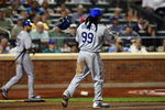 NEW YORK - JULY 07:  Manny Ramirez #99 of the Los Angeles Dodgers reacts after striking out in the fifth inning against the New York Mets on July 7, 2009 at Citi Field in the Flushing neighborhood of the Queens borough of New York City.  (Photo by Jim McIsaac/Getty Images)