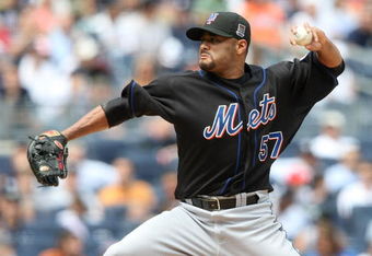 NEW YORK - JUNE 14:  Johan Santana #57 of the New York Mets pitches against the New York Yankees on June 14, 2009 at Yankee Stadium in the Bronx borough of New York City.  (Photo by Nick Laham/Getty Images)