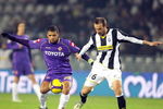 TURIN, ITALY -  JANUARY 24:   Cristiano Zanetti of Juventus and Felipe Melo of Fiorentina in action during the Serie A match between Juventus and Fiorentina at the Olimpico Stadio on January 24, 2009 in Turin, Italy. (Photo by New Press/Getty Images)