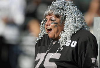 OAKLAND, CA - NOVEMBER 30:  A fan of the Oakland Raiders yells from the stands against the Kansas City Chiefs during an NFL game on November 30, 2008 at the Oakland-Alameda County Coliseum in Oakland, California. (Photo by Jed Jacobsohn/Getty Images)