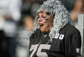 OAKLAND, CA - NOVEMBER 30:  A fan of the Oakland Raiders yells from the stands against the Kansas City Chiefs during an NFL game on November 30, 2008 at the Oakland-Alameda County Coliseum in Oakland, California. (Photo by Jed Jacobsohn/Getty Images)