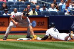 NEW YORK - JULY 06:  Derek Jeter #2 of the New York Yankees is tagged out on a first inning steal attempt of third base by Scott Rolen #33 of the Toronto Blue Jays on July 6, 2009 at Yankee Stadium in the Bronx borough of New York City.  (Photo by Jim McIsaac/Getty Images)