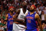 BOSTON - MAY 28:  Rasheed Wallace #36 and Richard Hamilton #32 of the Detroit Pistons box out against Kevin Garnett #5 of the Boston Celtics during Game Five of the Eastern Conference finals during the 2008 NBA Playoffs at TD Banknorth Garden on May 28, 2008 in Boston, Massachusetts. NOTE TO USER: User expressly acknowledges and agrees that, by downloading and/or using this photograph, user is consenting to the terms and conditions of the Getty Images License Agreement.  (Photo by Jim Rogash/Getty Images)