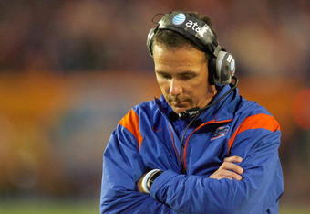 MIAMI - JANUARY 08:  Head coach Urban Meyer of the Florida Gators walks on the sidelines against the Oklahoma Sooners during the FedEx BCS National Championship Game at Dolphin Stadium on January 8, 2009 in Miami, Florida.  (Photo by Eliot J. Schechter/Getty Images