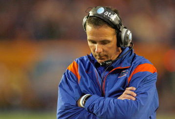 MIAMI - JANUARY 08:  Head coach Urban Meyer of the Florida Gators walks on the sidelines against the Oklahoma Sooners during the FedEx BCS National Championship Game at Dolphin Stadium on January 8, 2009 in Miami, Florida.  (Photo by Eliot J. Schechter/Getty Images