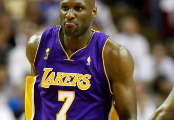 ORLANDO, FL - JUNE 14:  Lamar Odom #7 of the Los Angeles Lakers reacts in the third quarter against the Orlando Magic in Game Five of the 2009 NBA Finals on June 14, 2009 at Amway Arena in Orlando, Florida.  NOTE TO USER:  User expressly acknowledges and agrees that, by downloading and or using this photograph, User is consenting to the terms and conditions of the Getty Images License Agreement.  (Photo by Ronald Martinez/Getty Images)