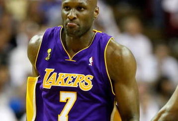 ORLANDO, FL - JUNE 14:  Lamar Odom #7 of the Los Angeles Lakers reacts in the third quarter against the Orlando Magic in Game Five of the 2009 NBA Finals on June 14, 2009 at Amway Arena in Orlando, Florida.  NOTE TO USER:  User expressly acknowledges and agrees that, by downloading and or using this photograph, User is consenting to the terms and conditions of the Getty Images License Agreement.  (Photo by Ronald Martinez/Getty Images)