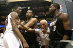 ATLANTA - APRIL 29:  Official Dick Bavetta #27 steps in between Dwyane Wade #3, Jamaal Magloire #21 of the Miami Heat and Solomon Jones #44 of the Atlanta Hawks after Wade was fouled hard during Game Five of the Eastern Conference Quarterfinals at Philips Arena on April 29, 2009 in Atlanta, Georgia. NOTE TO USER: User expressly acknowledges and agrees that, by downloading and/or using this Photograph, user is consenting to the terms and conditions of the Getty Images License Agreement.  (Photo by Doug Benc/Getty Images)