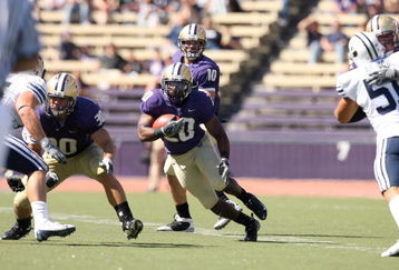 SEATTLE - SEPTEMBER 6:  David Freeman #20 of the Washington Huskies runs with the ball during their game against the BYU Cougars on September 6, 2008 at Husky Stadium in Seattle, Washington. The Cougars defeated the Huskies 28-27. (Photo by Otto Greule Jr/Getty Images)