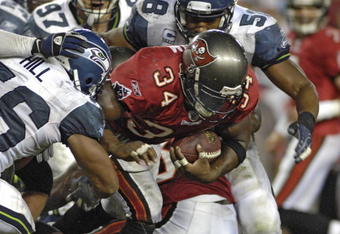 TAMPA, FL - OCTOBER 19: Running back Earnest Graham #34 of the Tampa Bay Buccaneers plays against the Seattle Seahawks at Raymond James Stadium on October 19, 2008 in Tampa, Florida.  (Photo by Al Messerschmidt/Getty Images) 