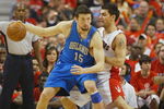 TORONTO, ON - APRIL 26:  Hedo Turkoglu #15 of the Orlando Magic tries to get outside of Carlos Delfino #20 of the Toronto Raptors in Game Four of the Eastern Conference Quarterfinals at the Air Canada Centre April 26, 2008 in Toronto, Ontario. The Magic defeated the Raptors 106-94 to take a 3-1 series lead.  (Photo by Claus Andersen/Getty Images)